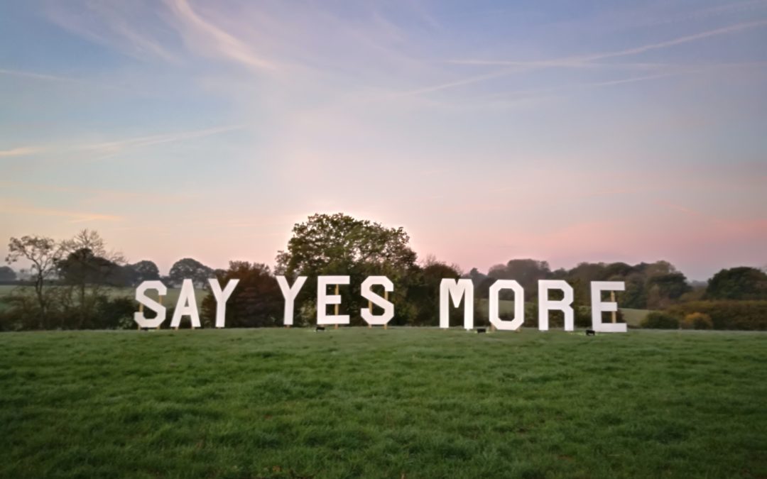 The SAY YES MORE sign at Yestival