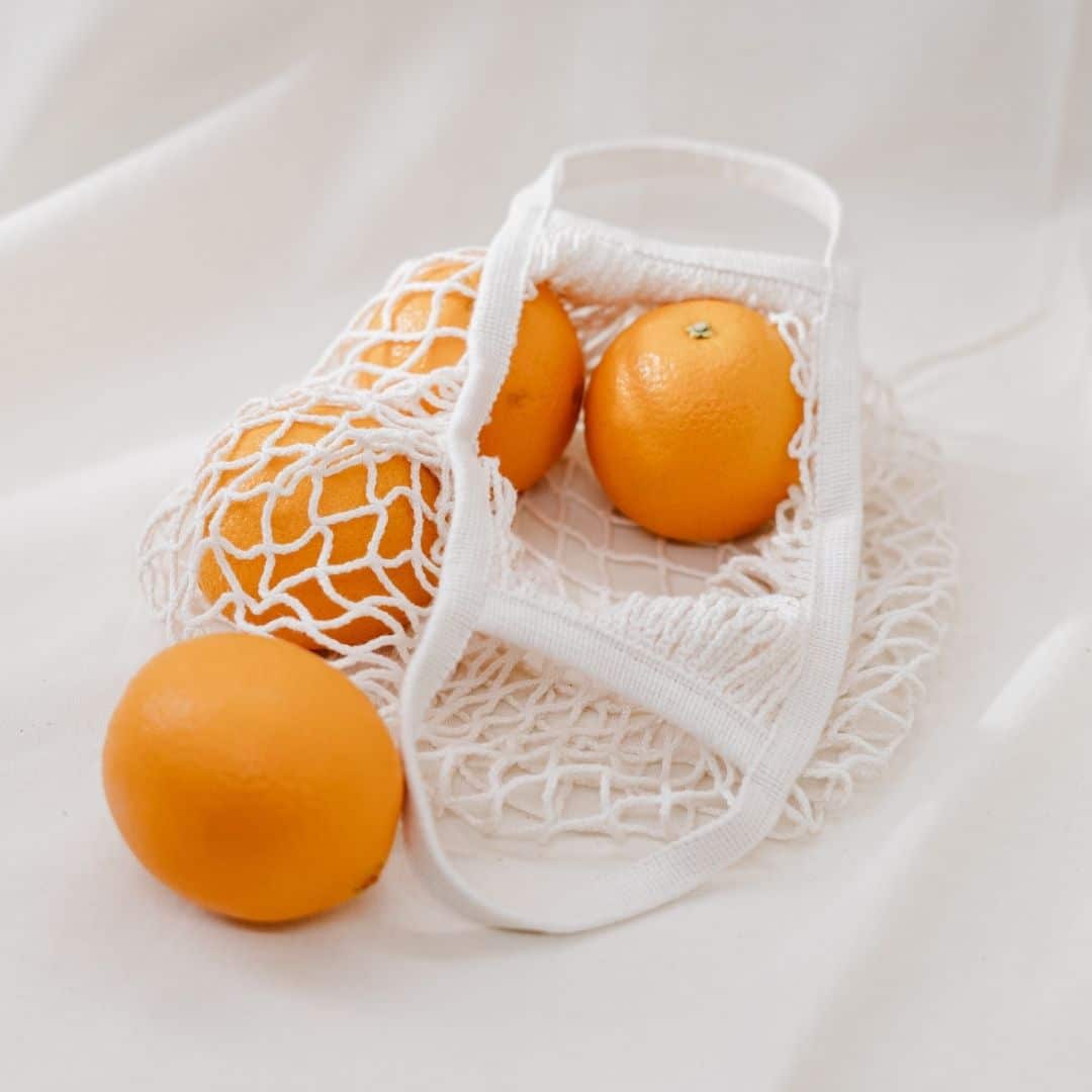 oranges in reusable produce bag