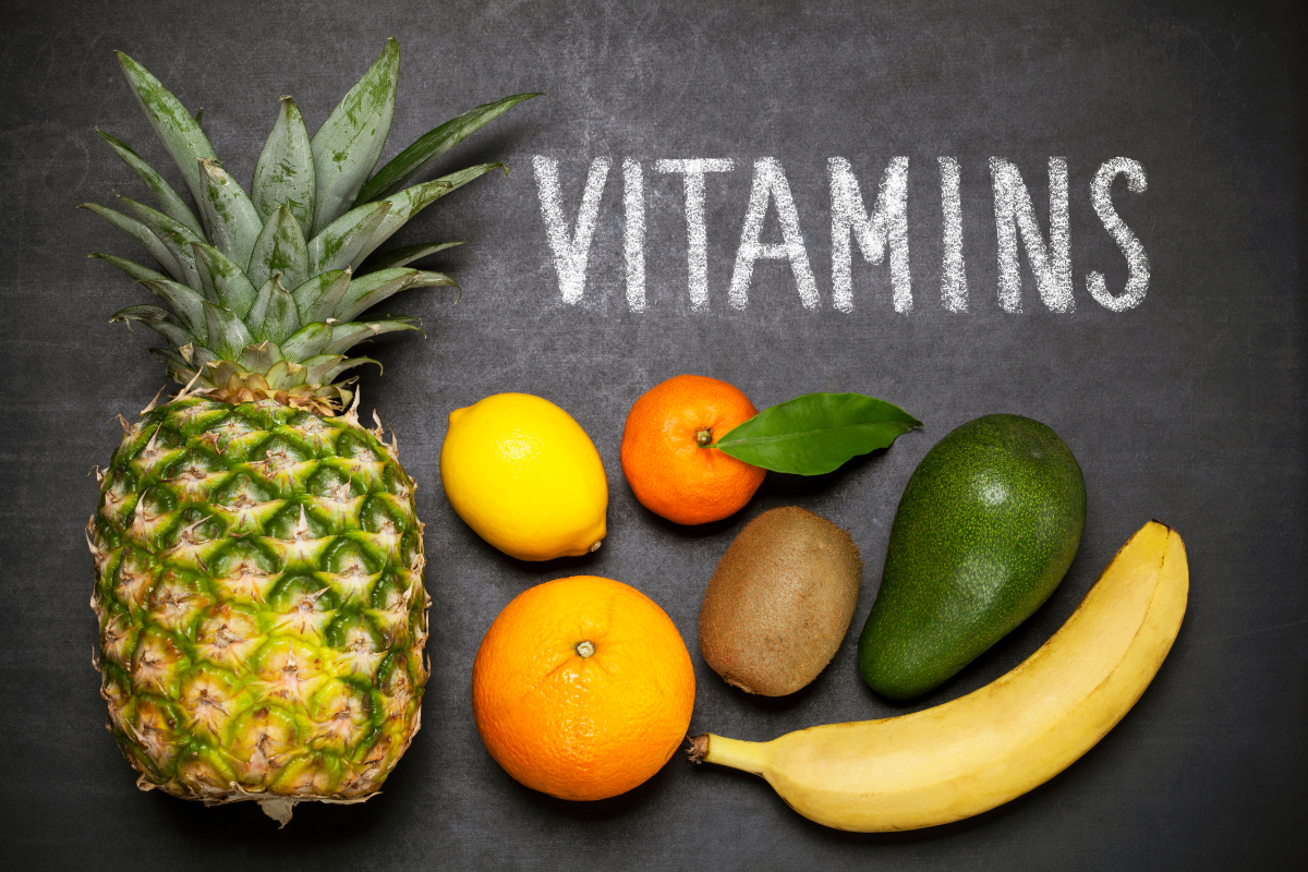 vitamins pic image of fruits and the word vitamins